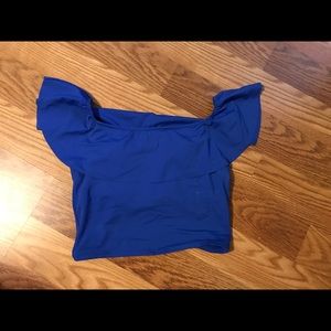 Ruffled around Kortni Jeane bathing suit top.